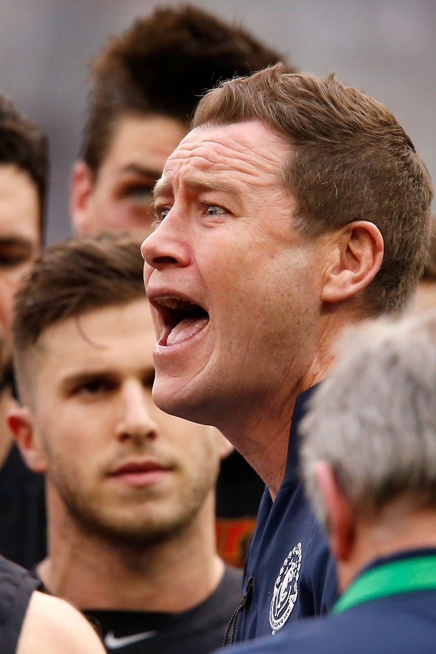 AFL 2015 Rd 19 - Collingwood v Carlton MELBOURNE, AUSTRALIA - AUGUST 8: Carlton John Barker speaks with his players during the 2015 AFL round 19 match between the Collingwood Magpies and the Carlton Blues at the Melbourne Cricket Ground, Melbourne, Australia on August 8, 2015. (Photo by Darrian Traynor/AFL Media)